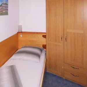Single Room Shared Shower Toilet